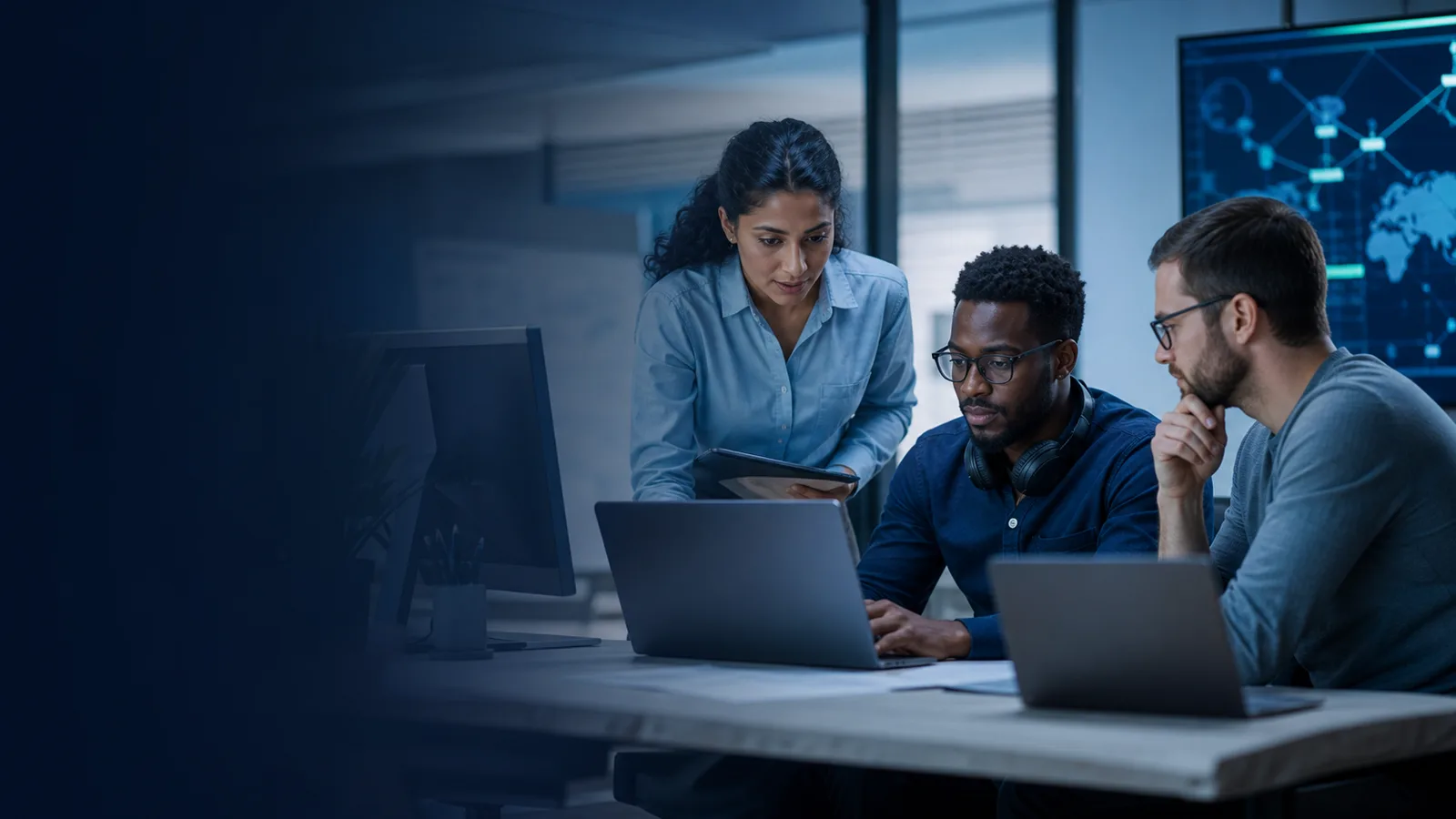 IT support professionals collaborating on remote business technology services